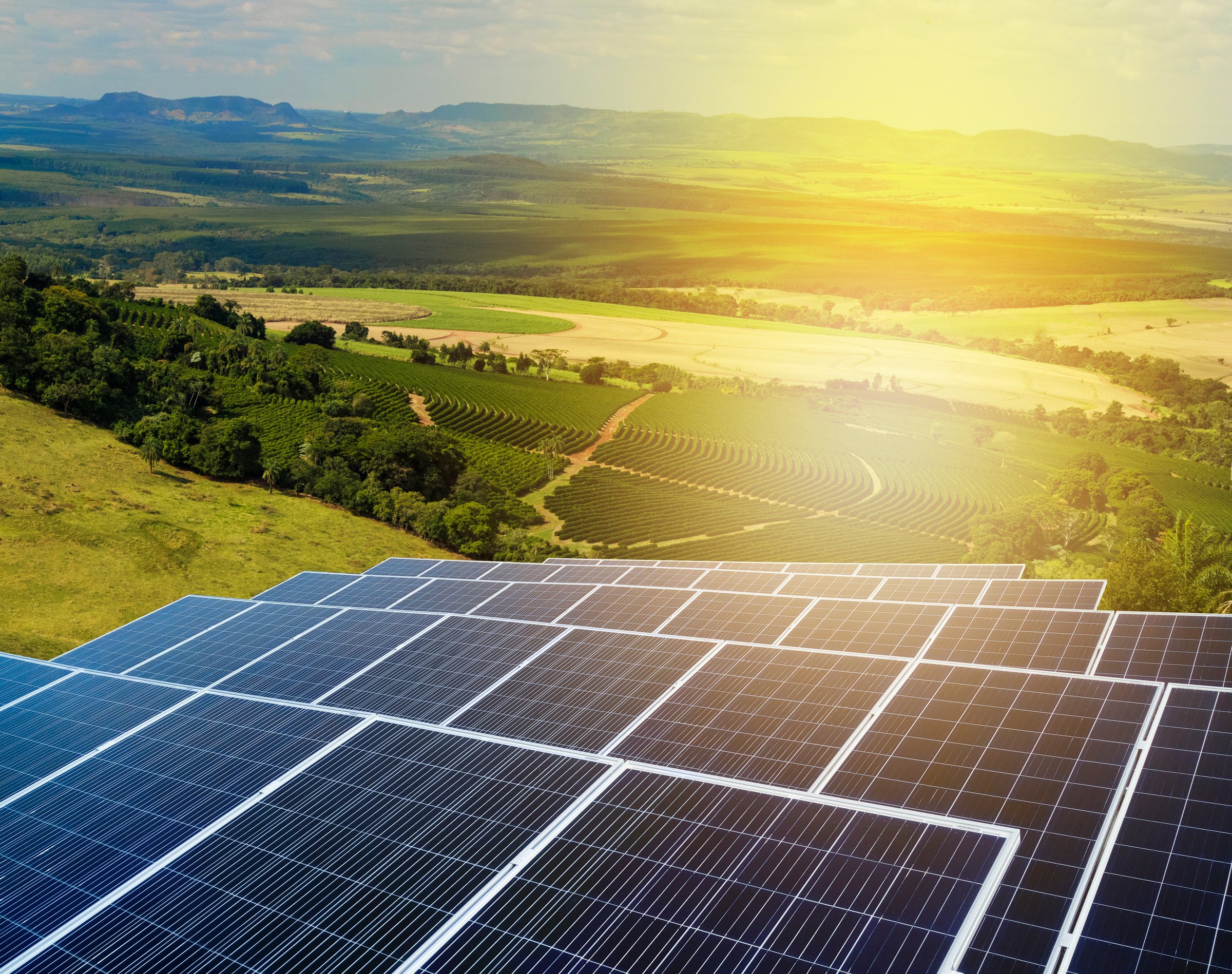 Sunset over Solar energy Farm plant